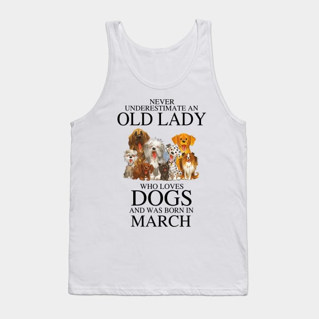 Never Underestimate An Old Lady Who Loves Dogs And Was Born In March Tank Top by louismcfarland